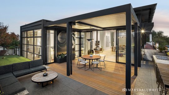A spacious outdoor entertaining area comes with a built-in barbecue.
