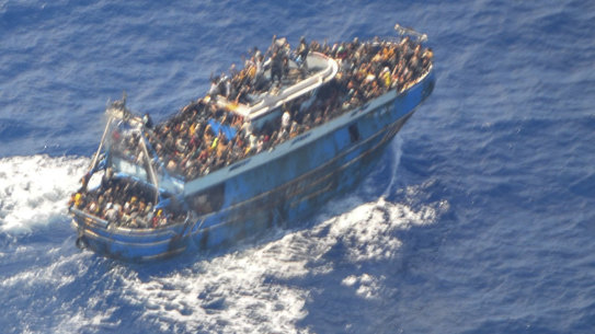 Scores of people on the battered fishing boat that later capsized and sank off southern Greece. 