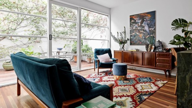 Interior designer’s Clifton Hill townhouse fetches $1.4m at auction