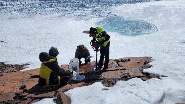 Dr Richard Jones and his team drilling into the bedrock.