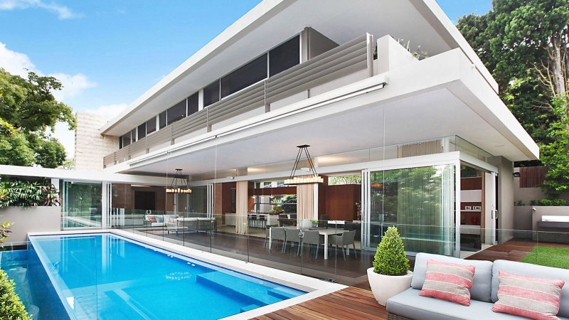 Luxury house with one of Sydney’s more intriguing back-stories sells for $13.9m at auction