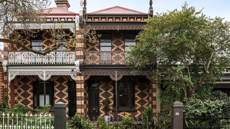 Family nabs rare Fitzroy North terrace for $2.6m in nail-biting auction
