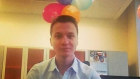 Not the stereotypical view of a villainous cyber mastermind: Aleksandr Ermakov is snapped with his party balloons.