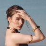 Dress and jewellery by Gucci.
