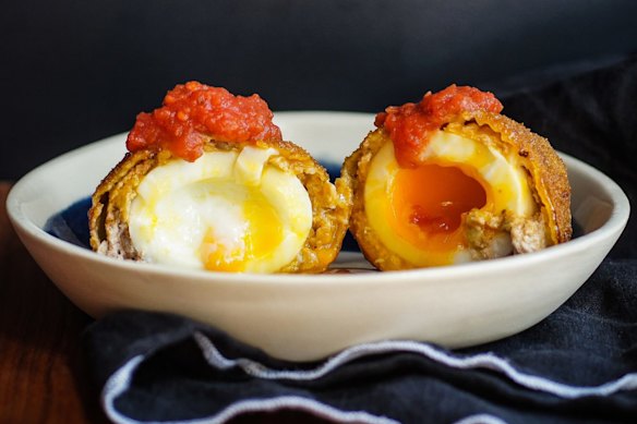 Bloody Mary pork scotch egg with tomato-Tabasco relish.