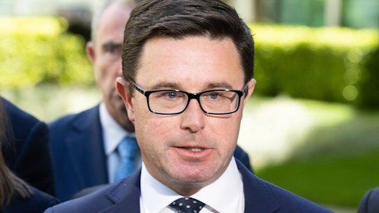 Nationals leader David Littleproud surrounded by his colleagues as they announce their opposition to the Voice referendum.