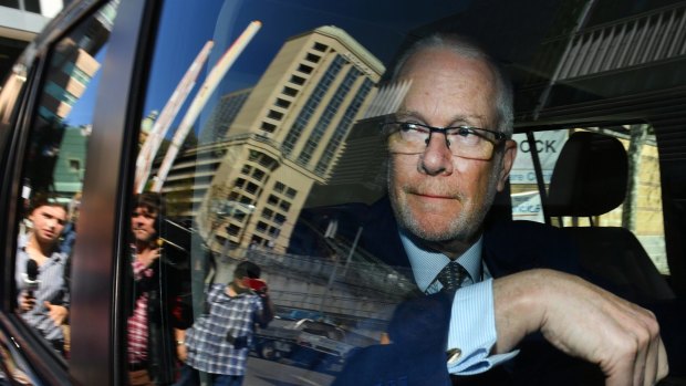 Former ABC chairman Justin Milne leaves the ABC studios in Sydney after resigning his chairmanship on September 27.