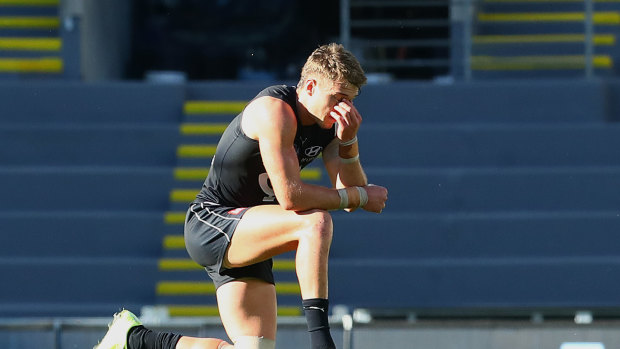 Sinking feeling: Captain Patrick Cripps after the Blues were beaten after the siren by Port