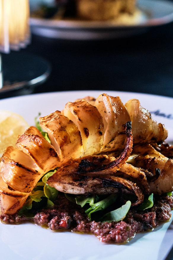 Grilled calamari on olive tapenade.