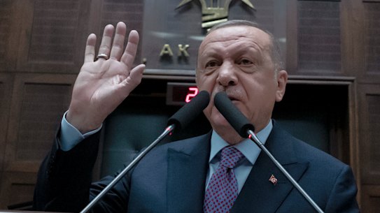 Turkey's President Recep Tayyip Erdogan speaks to his supporters at parliament.