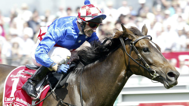 Jockey Glen Boss and Makybe Diva creating history by winning their third successive Melbourne Cup.