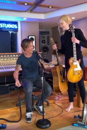 Country music star Keith Urban in his home studio with his wife, actress and 'roadie' Nicole Kidman. 
