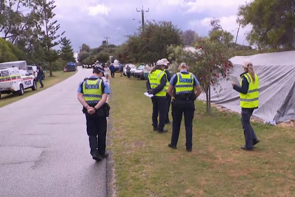Police and department officers attending Memorial Drive in the City of Rockingham.