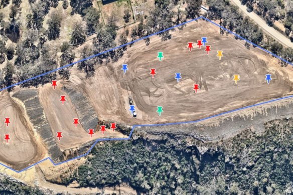 The cleared land at Canyonleigh in the Southern Highlands. Each pin point represents where the EPA and a certifier located asbestos during four different test periods from November 2022 to November 2023.