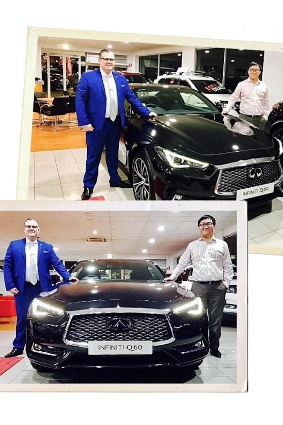 Nick Zhao (right) at his car dealership.
