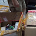 Thomas Markle’s son seen handing over VHS tapes and dismantled computers to police in footage released by Philippine authorities.