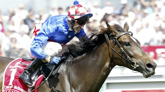 Makybe Diva and Glen Boss win the third of their Melbourne Cups at Flemington.