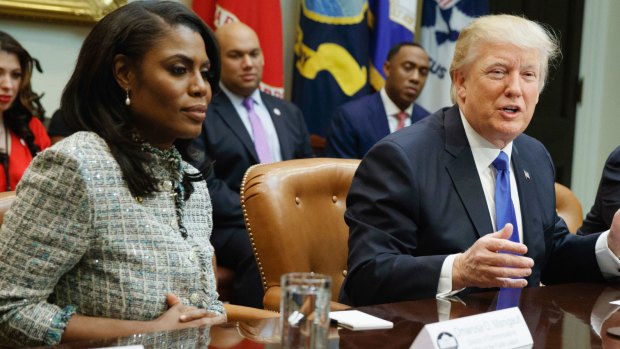 President Donald Trump speaks during a meeting on African American History Month with Omarosa Manigault Newman (left),