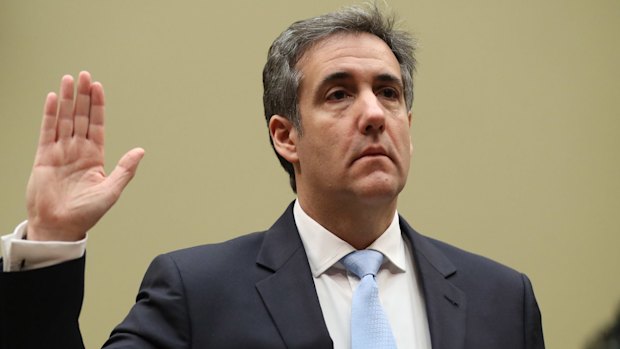 Michael Cohen takes the oath.