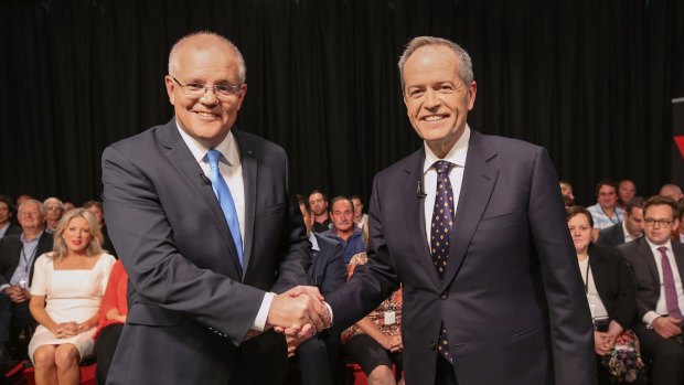 Prime Minister Scott Morrison and Opposition Leader Bill Shorten shake hands ahead of the debate. 
