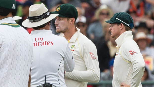 Bancroft and Smith talking to the umpire on the third day of the third cricket test.