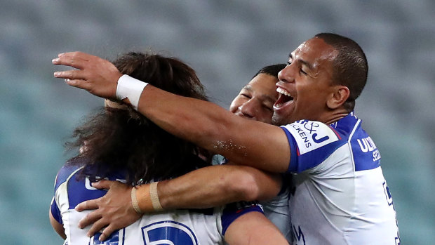 Canterbury celebrate their upset win against South Sydney at ANZ Stadium on Thursday night.