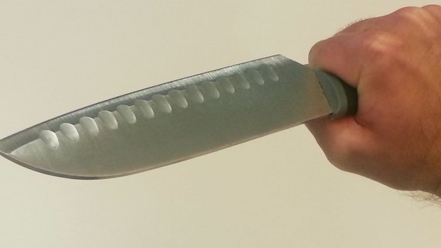 A knife was used in the robbery.