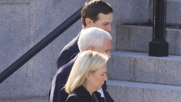 US Homeland Security Secretary Kirstjen Nielsen, foreground, Vice-President Mike Pence and White House senior adviser Jared Kushner on their way to a meeting with House and Senate leadership on Sunday.