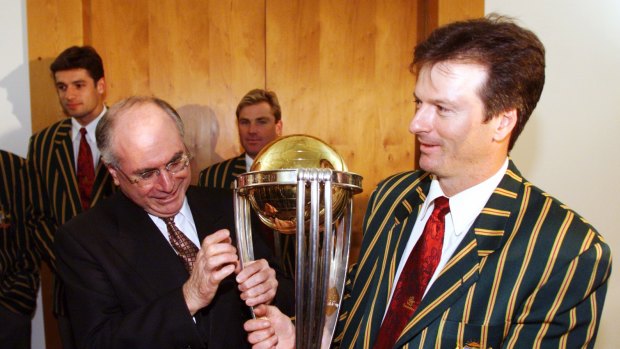 Winner: Steve Waugh shows off the 1999 Cricket World Cup trophy to then Prime Minister John Howard.