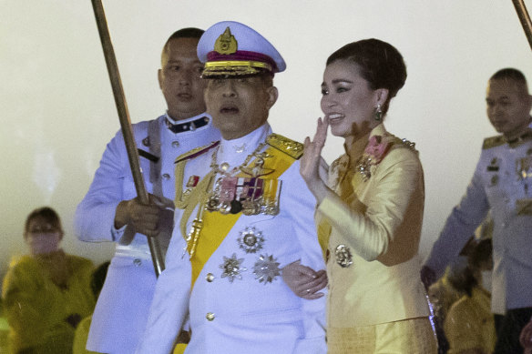 Thailand's King Maha Vajiralongkorn and Queen Suthida leave from Grand Palace after a ceremony marking the fourth anniversary of the death of his father.