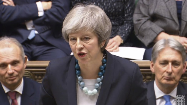 Theresa May speaks announces that she has postponed Parliament's vote on her European Union divorce deal.