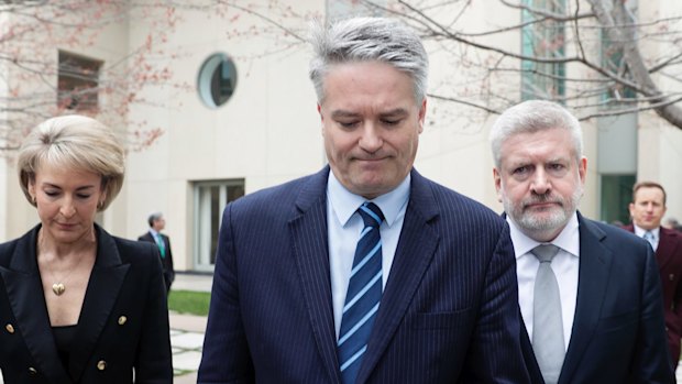 Michaelia Cash, Mathias Cormann and Mitch Fifield address the media on Thursday.