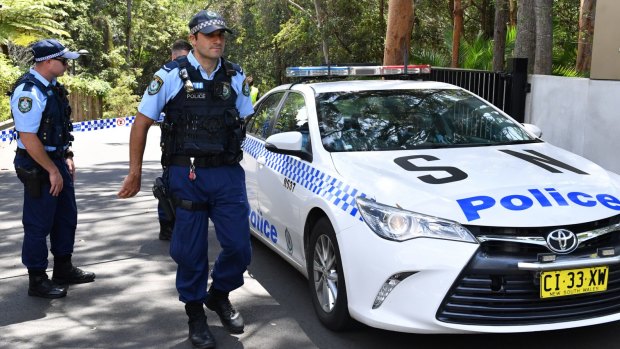 Police at the Church of Scientology headquarters in Chatswood on Thursday.