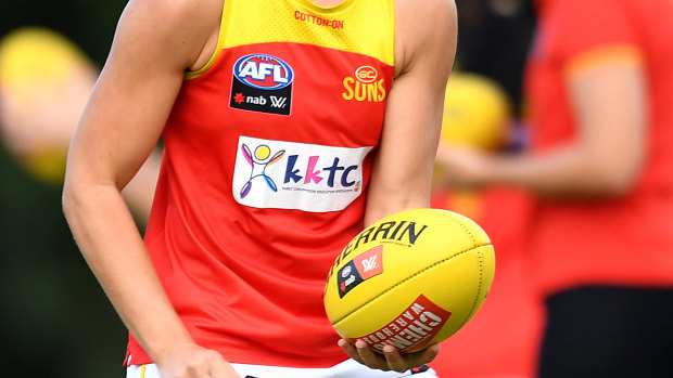 Gold Coast players are isolating after a squad member tested positive to COVID-19 just days from the start of their AFLW season.