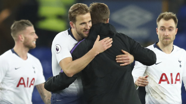 Tottenham manager Mauricio Pochettino hugs his star player Harry Kane.
