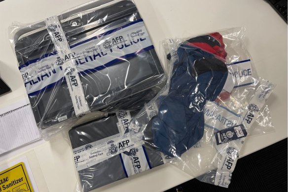 The evidence seized by police after an investigation into a Queensland man accused of having sexualised conversations with children in the Philippines. 