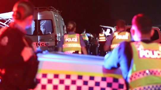 Police at the Bedford scene on Monday night.