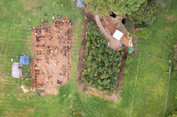 Volunteers planting a tiny forest in December 2025 on the 16-hectare property belonging to Justine de Mestre and Mark Hope in Yarramalong Valley, on the Central Coast.