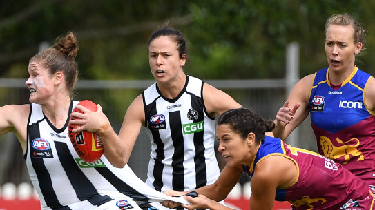 Brianna Davey tackled by Alexandra Anderson.