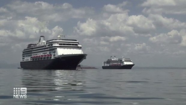 The Zaandam's sister ship, the Rotterdam, has docked alongside the cruise liner as a rescue vessel. 