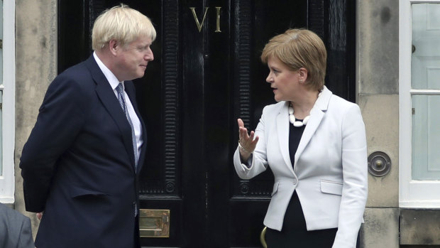 Scotland's First Minister Nicola Sturgeon greets Britain's Prime Minister Boris Johnson. 