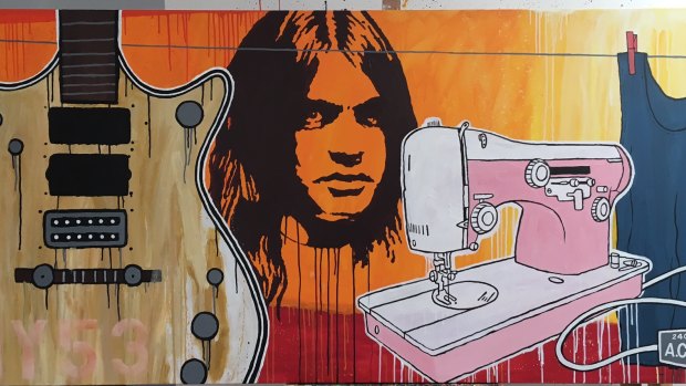 David Bowers' mural of AC/DC's late guitarist Malcolm Young features on a Collingwood office building.