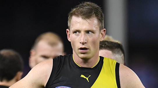 Nervous wait: the loss of defender Dylan Grimes would be a blow as Richmond aim for a top-two finish.