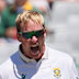 South Africa’s Simon Harmer, left, celebrates with teammate Aiden Markram the wicket of Australia’s Josh Inglis on day three.