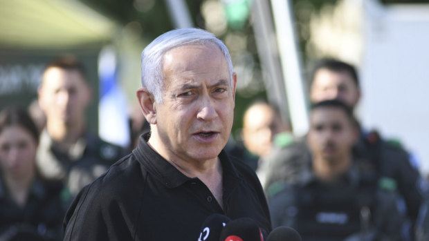Israeli Prime Minister Benjamin Netanyahu meets with Israeli border police in Lod, near Tel Aviv.