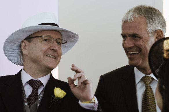 Former Tabcorp boss Elmer Funke Kupper alongside successor David Attenborough.