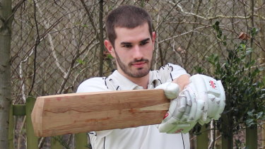 Co-author of the paper Ben Tinkler-Davies tries out a bat made from bamboo.