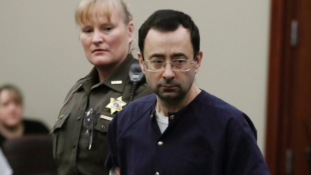 Larry Nassar is escorted into court during his sentencing hearing in Lansing, Michigan in January.