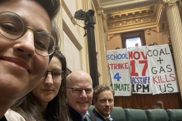The Greens’ four state lower house MPs in a selfie with the young climate protesters who disrupted the Victorian parliament on Tuesday.