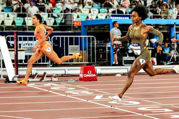 Torrie Lewis (far left) pips Sha’Carri Richardson to the line in the 200m in China.